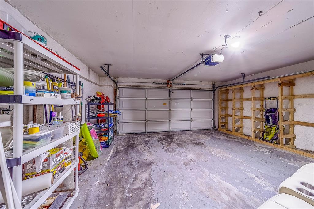 14414 91st Avenue North Seminole, FL 33776 - Photo 28 of 58 a view of a garage with toys