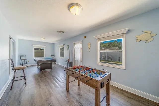 a living room with furniture and a table