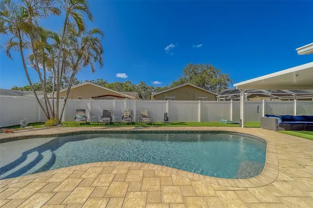 a view of a backyard with garden