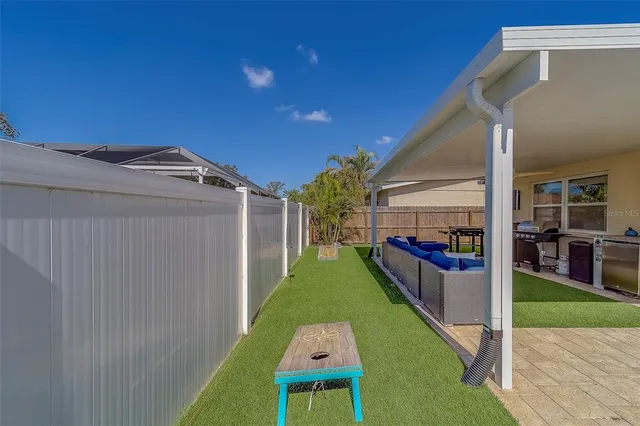 a swimming pool with a yard