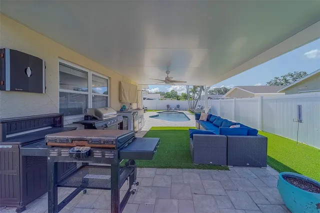 an aerial view of a house with swimming pool