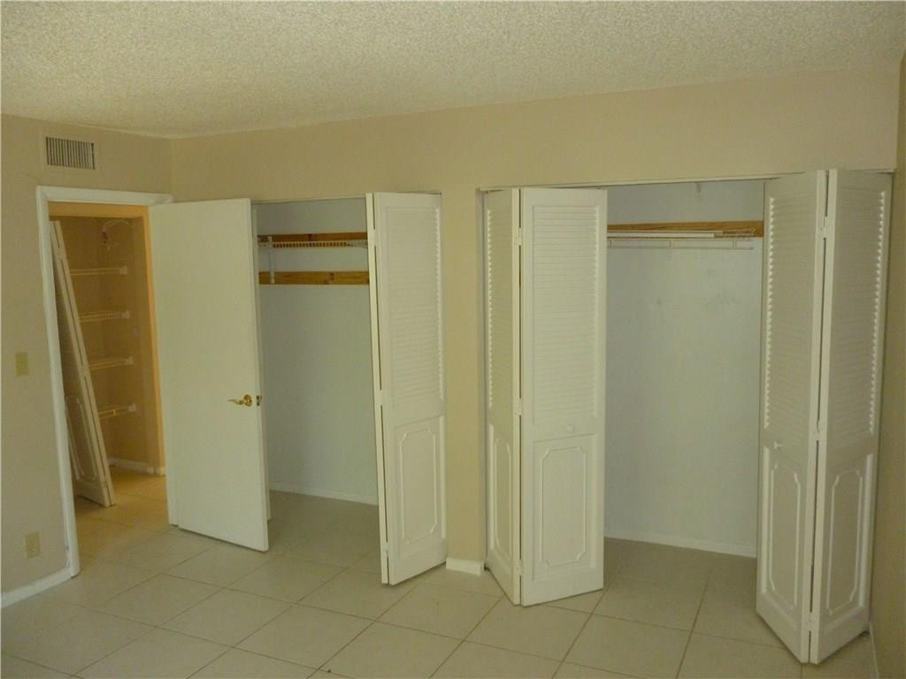 2131 Northeast 41st Street, Unit 107 Lighthouse Point, FL 33064 - Photo 16 of 18 a view of an empty room