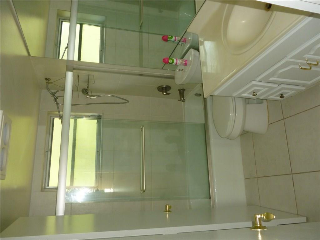 2131 Northeast 41st Street, Unit 107 Lighthouse Point, FL 33064 - Photo 17 of 18 a bathroom with a shower