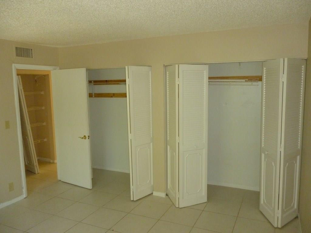 2131 Northeast 41st Street, Unit 107 Lighthouse Point, FL 33064 - Photo 2 of 18 a view of an empty room