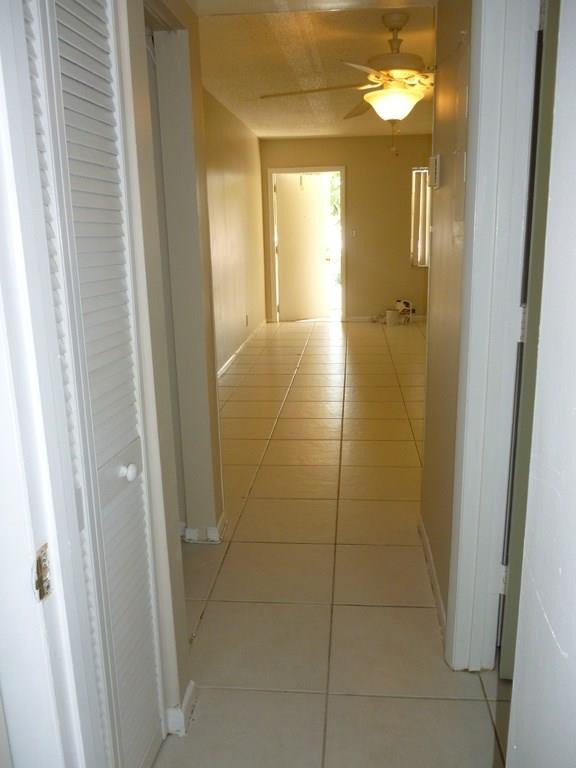 2131 Northeast 41st Street, Unit 107 Lighthouse Point, FL 33064 - Photo 4 of 18 a bathroom with a shower