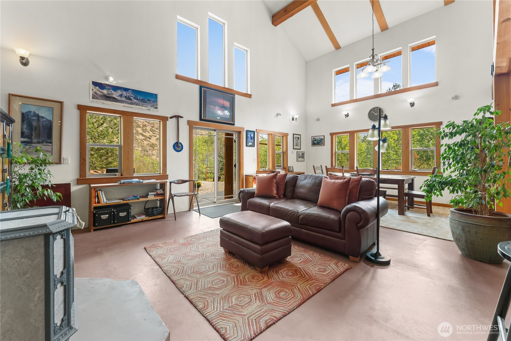 96 Alder Creek Road Twisp, WA 98856 - Photo 5 of 40 a living room with furniture and a potted plant