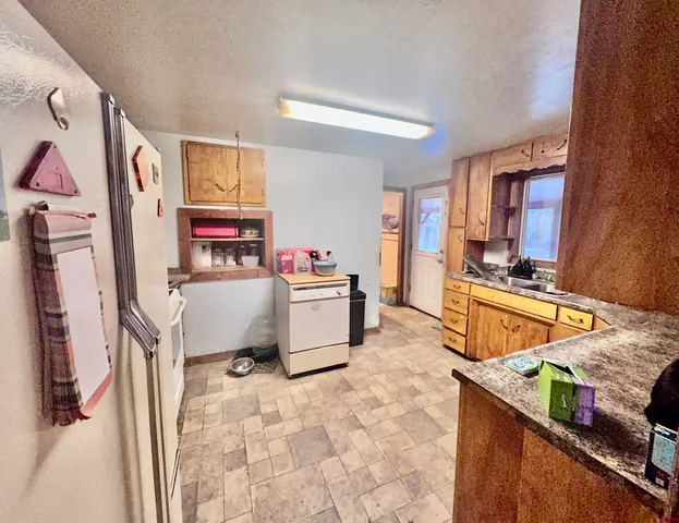 a bed room with furniture and flat screen tv