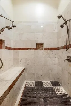 a bathroom with a sink and a shower