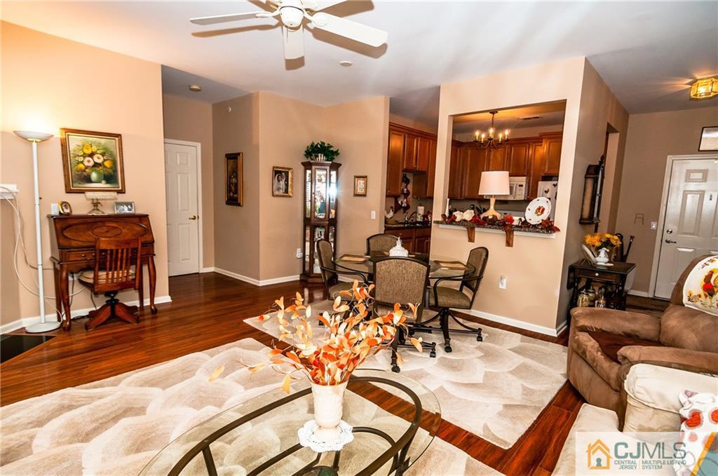 203 Potts Road Morganville, NJ 07751 - Photo 20 of 25 a view of a livingroom and dining room