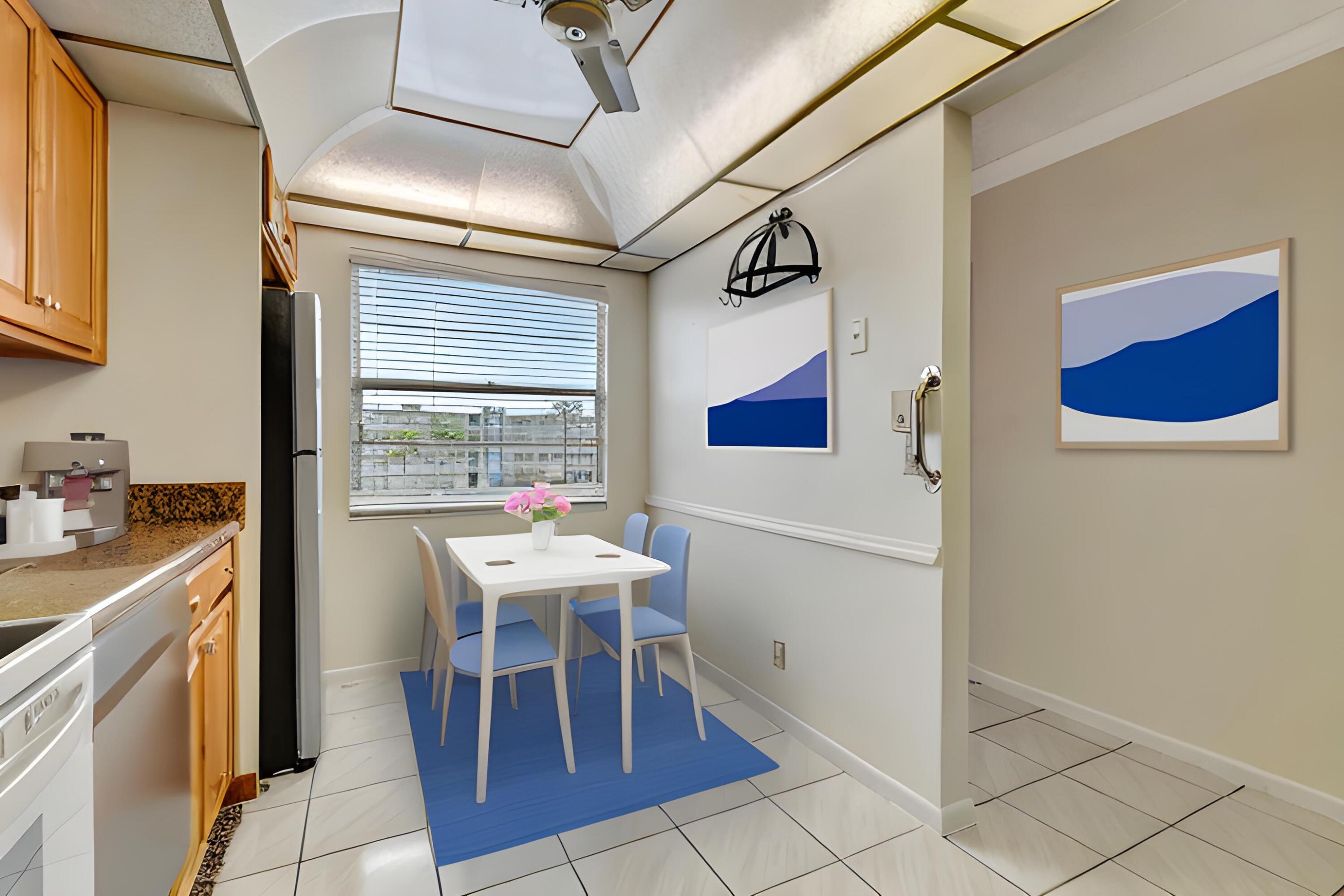 3021 Lincoln B Boca Raton, FL 33434 - Photo 20 of 48 Virtual Staging AI Eat-In-Kitchen.jpg-De