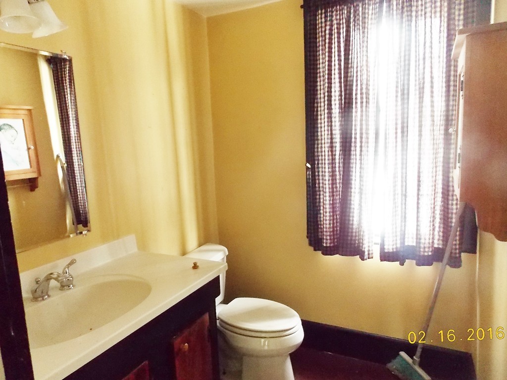 7 Wilder Lane Sterling, MA 01564 - Photo 14 of 21 a bathroom with a sink and a toilet