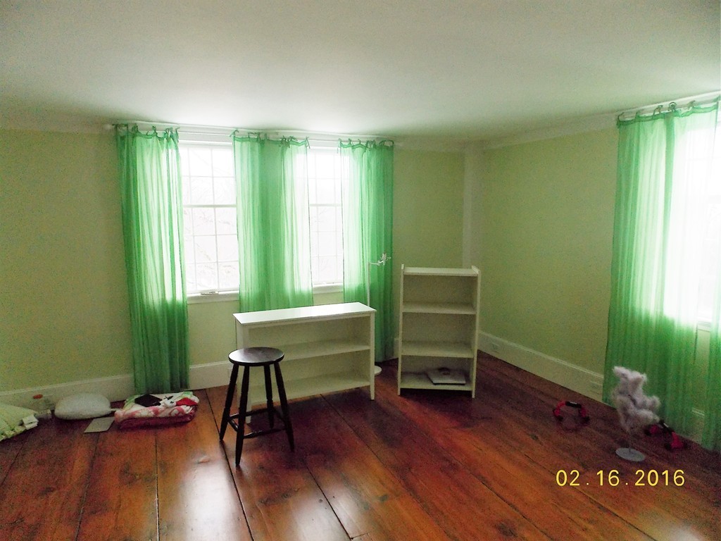 7 Wilder Lane Sterling, MA 01564 - Photo 15 of 21 a room with furniture and a window