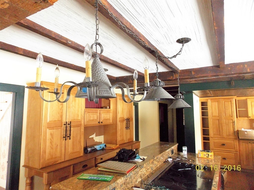 7 Wilder Lane Sterling, MA 01564 - Photo 2 of 21 a room with lots of windows and glass door