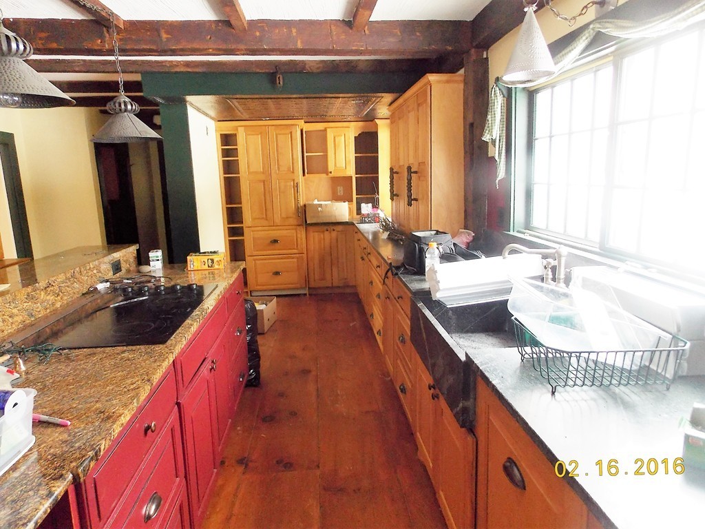 7 Wilder Lane Sterling, MA 01564 - Photo 3 of 21 a large bathroom with a granite countertop sink and a large mirror
