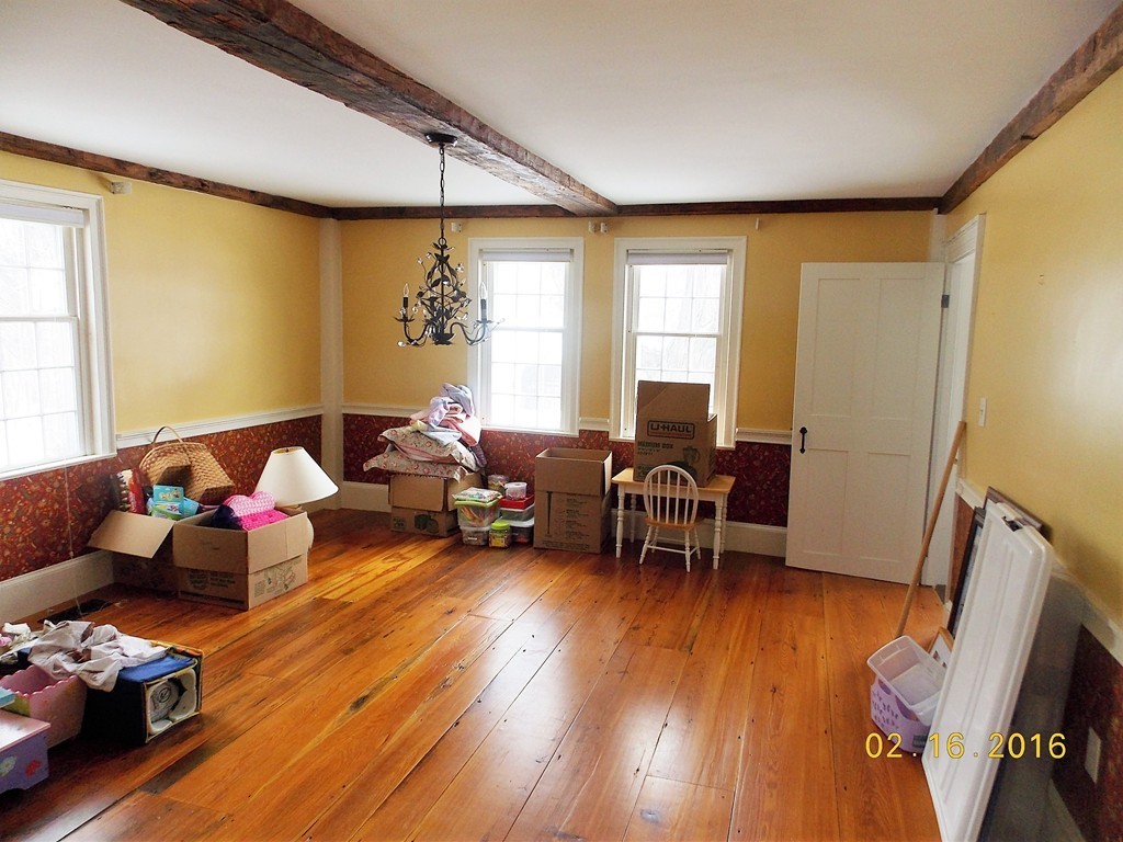 7 Wilder Lane Sterling, MA 01564 - Photo 6 of 21 a living room with furniture and a wooden floor