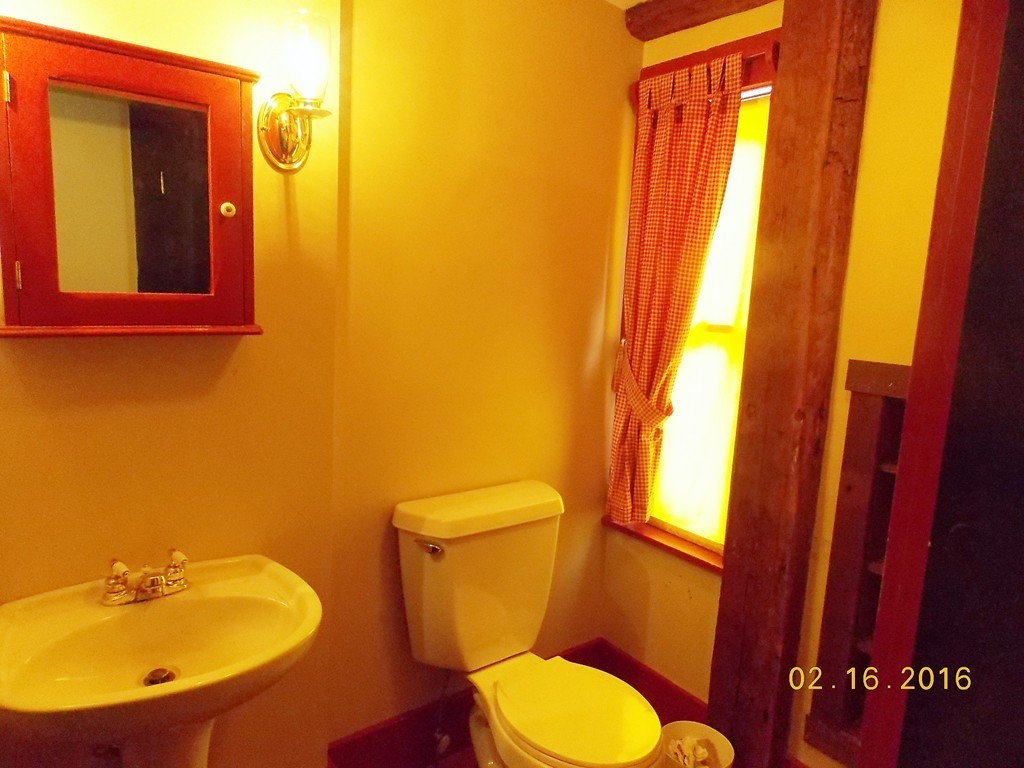 7 Wilder Lane Sterling, MA 01564 - Photo 8 of 21 a bathroom with a toilet and a sink