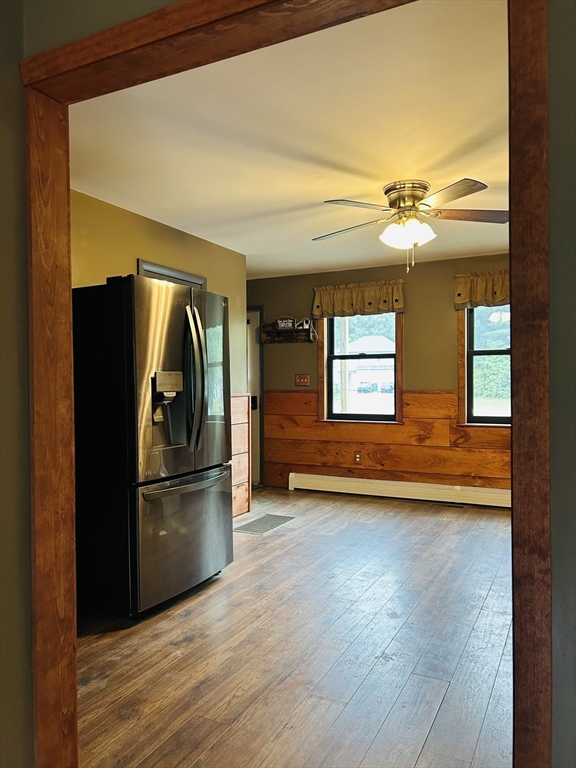 32 Sandy Pine Road Templeton, MA 01468 - Photo 15 of 30 a kitchen with stainless steel appliances granite countertop a refrigerator a stove and a sink with wooden floor