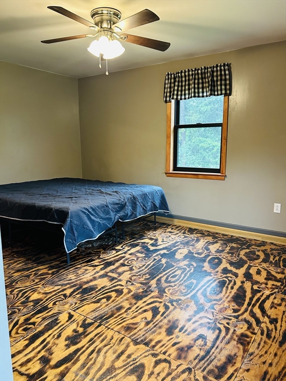 32 Sandy Pine Road Templeton, MA 01468 - Photo 22 of 30 a bedroom with a bed and a window