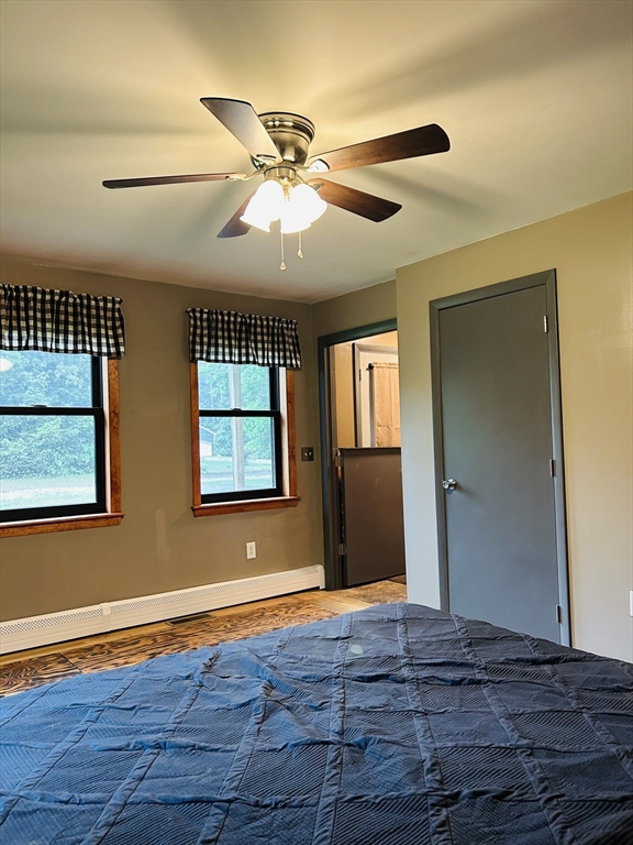 32 Sandy Pine Road Templeton, MA 01468 - Photo 24 of 30 a view of an empty room with wooden floor and a window