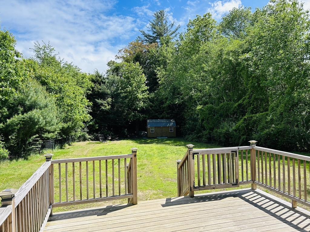 32 Sandy Pine Road Templeton, MA 01468 - Photo 7 of 30 a view of balcony with wooden floor and fence