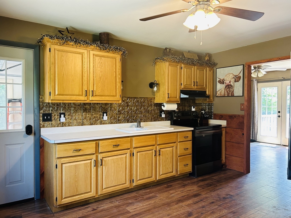 32 Sandy Pine Road Templeton, MA 01468 - Photo 8 of 30 a kitchen with a sink cabinets and wooden floor