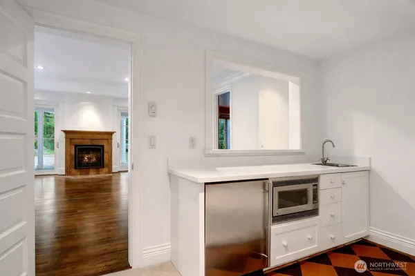 a kitchen with stainless steel appliances granite countertop a stove and a sink