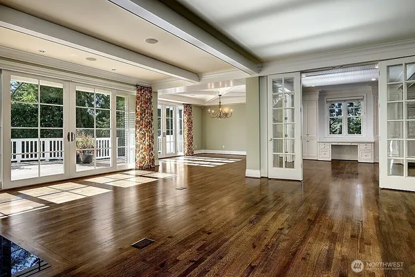 a view of a porch with wooden floor and iron walls