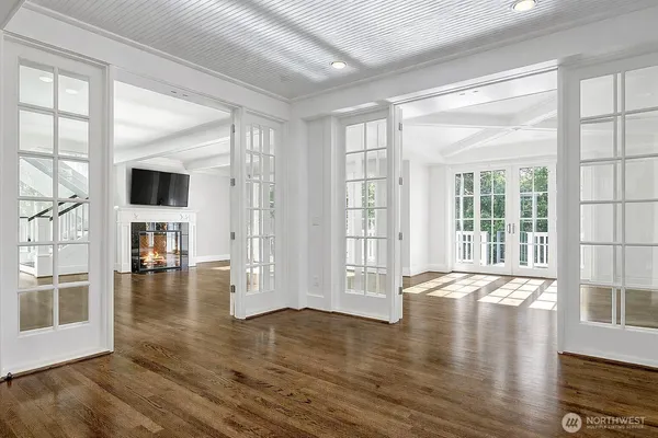 a view of livingroom with furniture wooden floor and windows