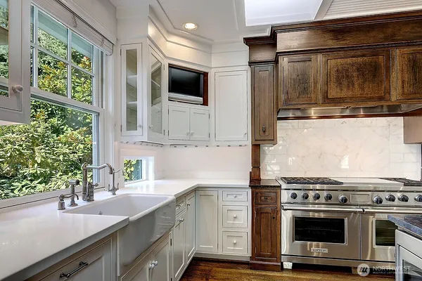 a kitchen with a stove and a microwave