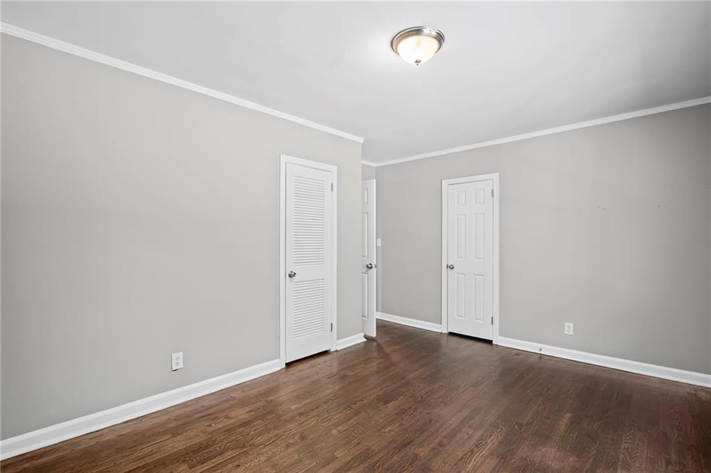 2790 Collier Drive Northwest Atlanta, GA 30318 - Photo 22 of 44 a view of an empty room with wooden floor