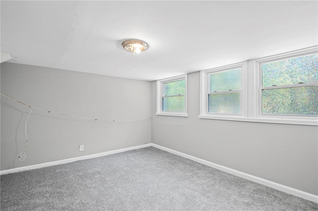 2790 Collier Drive Northwest Atlanta, GA 30318 - Photo 36 of 44 an empty room with windows