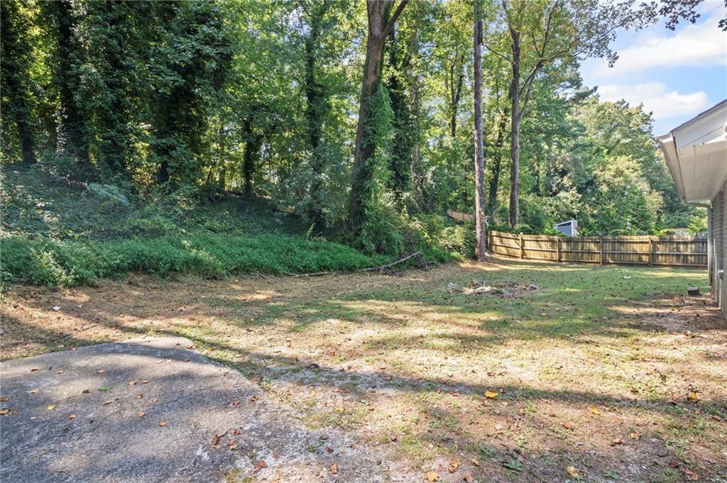 2790 Collier Drive Northwest Atlanta, GA 30318 - Photo 42 of 44 a view of a yard with a tree