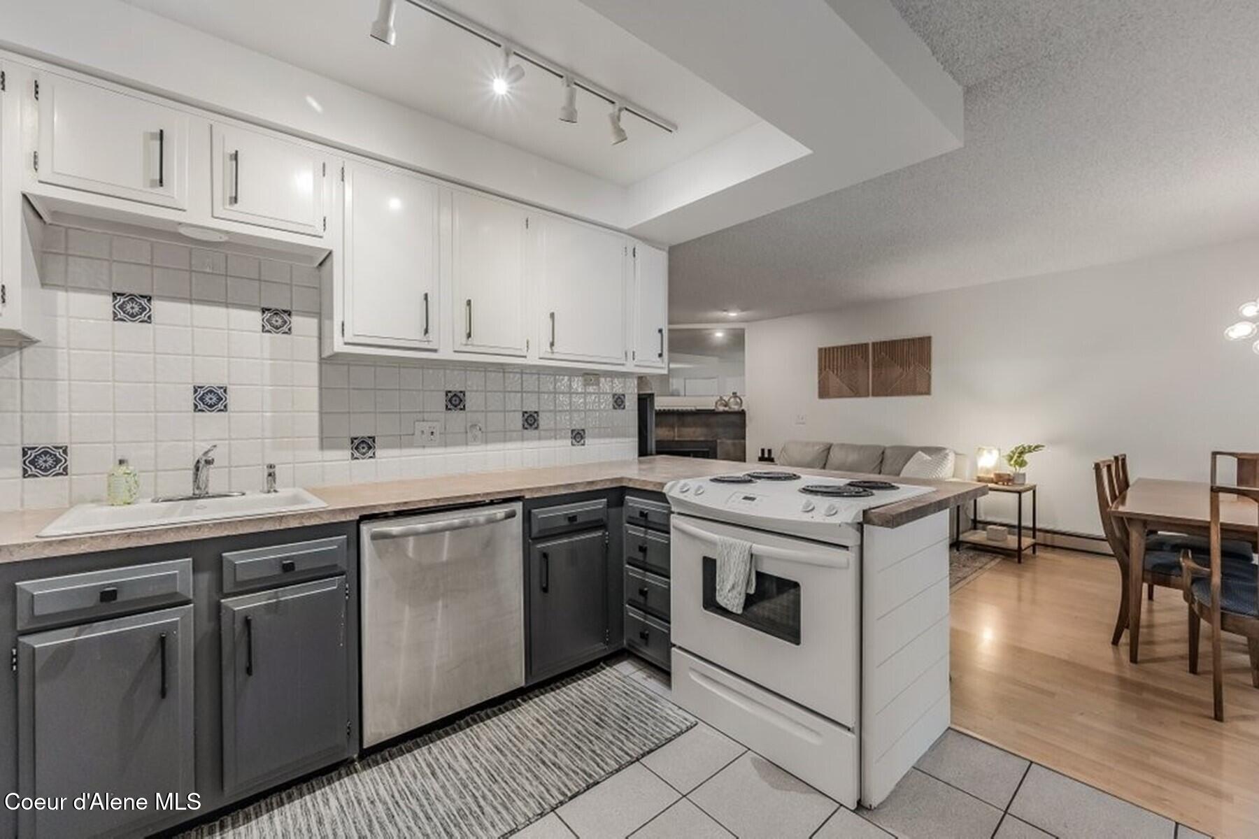 5480 West Racquet Road, Unit 4 Rathdrum, ID 83858 - Photo 5 of 28 Open Kitchen to Dining Space