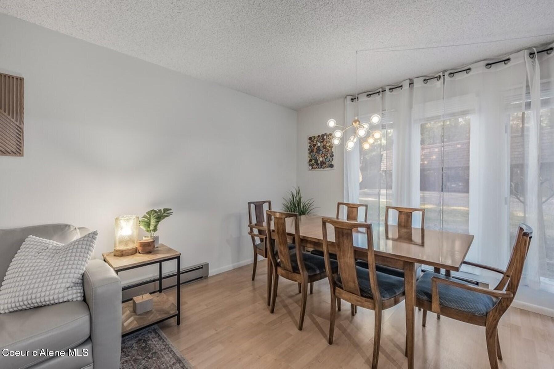 5480 West Racquet Road, Unit 4 Rathdrum, ID 83858 - Photo 8 of 28 Dining space can fit 6-8