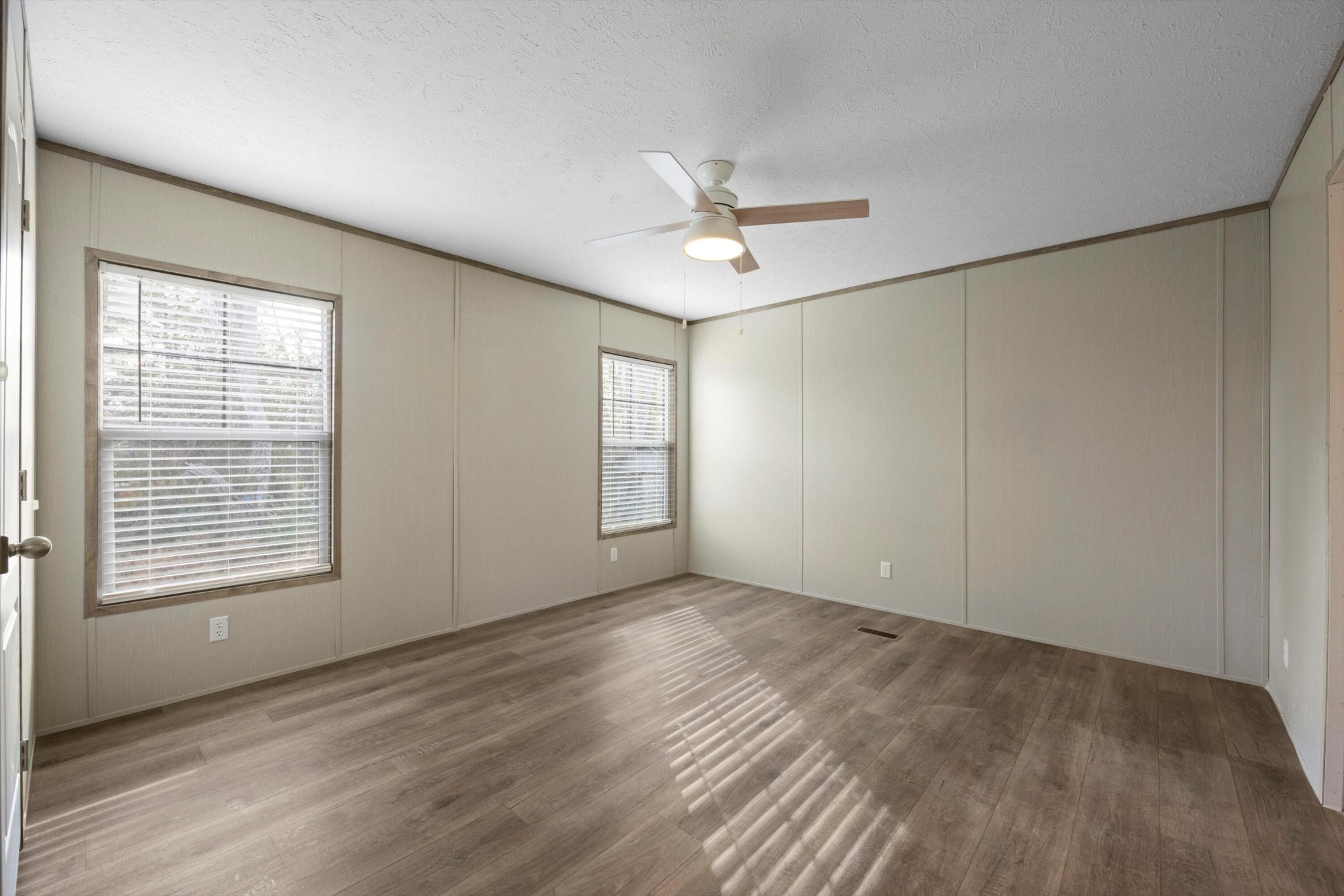 659 West Rhea Avenue Spring City, TN 37381 - Photo 17 of 31 a view of an empty room with a window and wooden floor