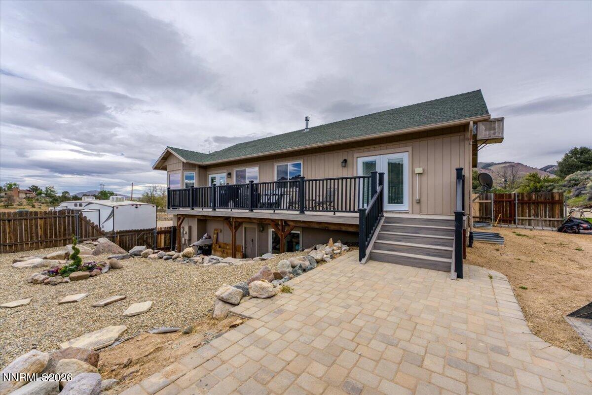 15770 Rocky Vista Road Reno, NV 89521 - Photo 42 of 68 a view of a house with wooden roof and sitting area