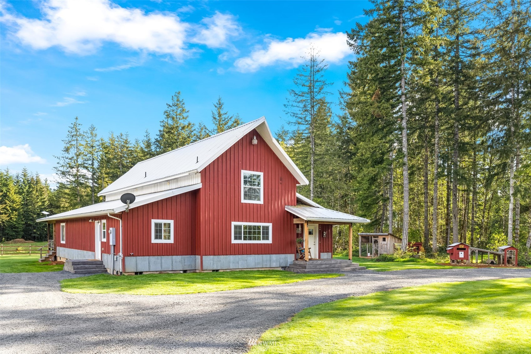 154 Rogerson Road Chehalis, WA 98532 - Photo 1 of 40 a front view of a house with a garden and yard