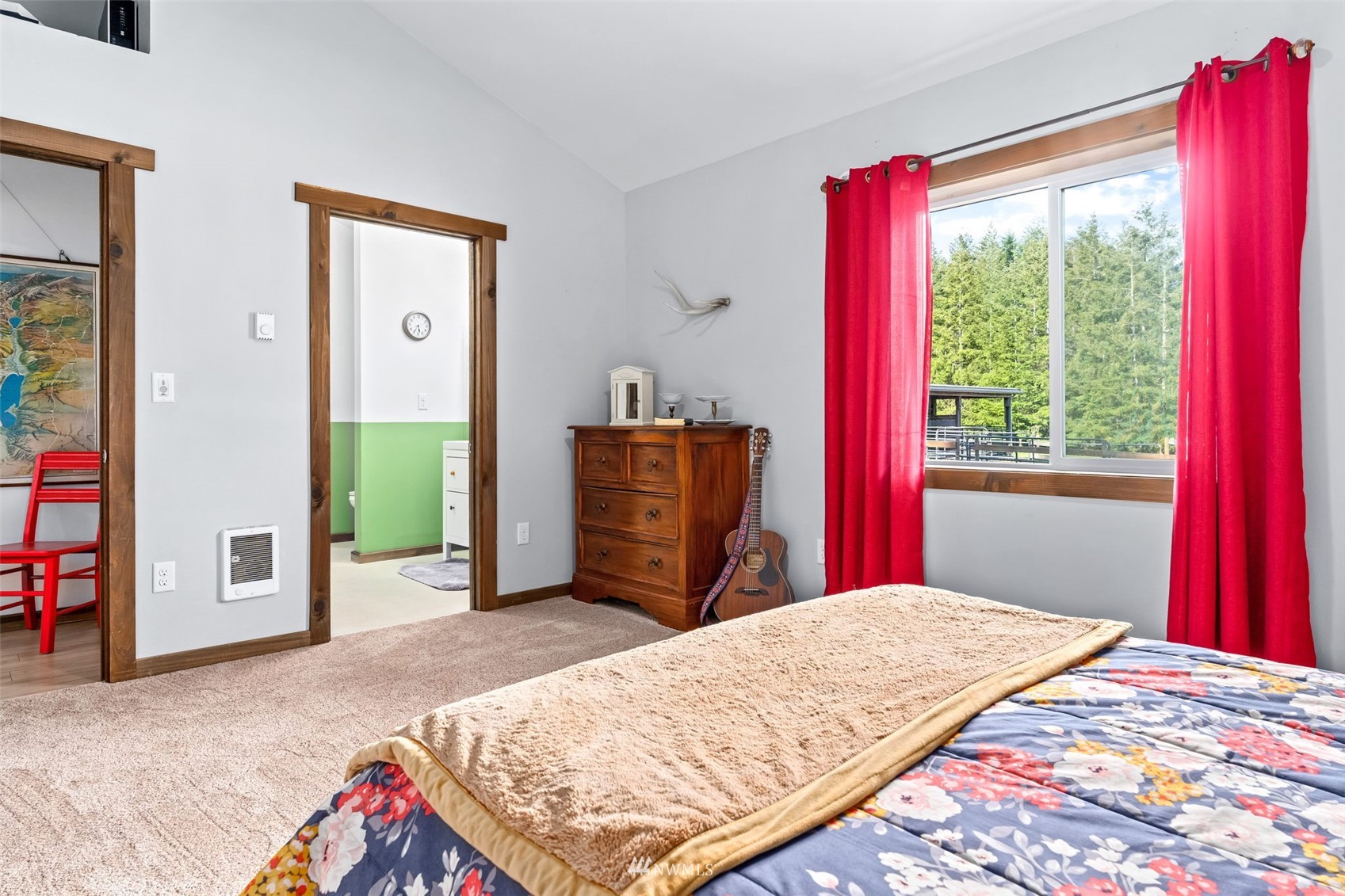 154 Rogerson Road Chehalis, WA 98532 - Photo 22 of 40 a bed sitting in a bedroom next to a window