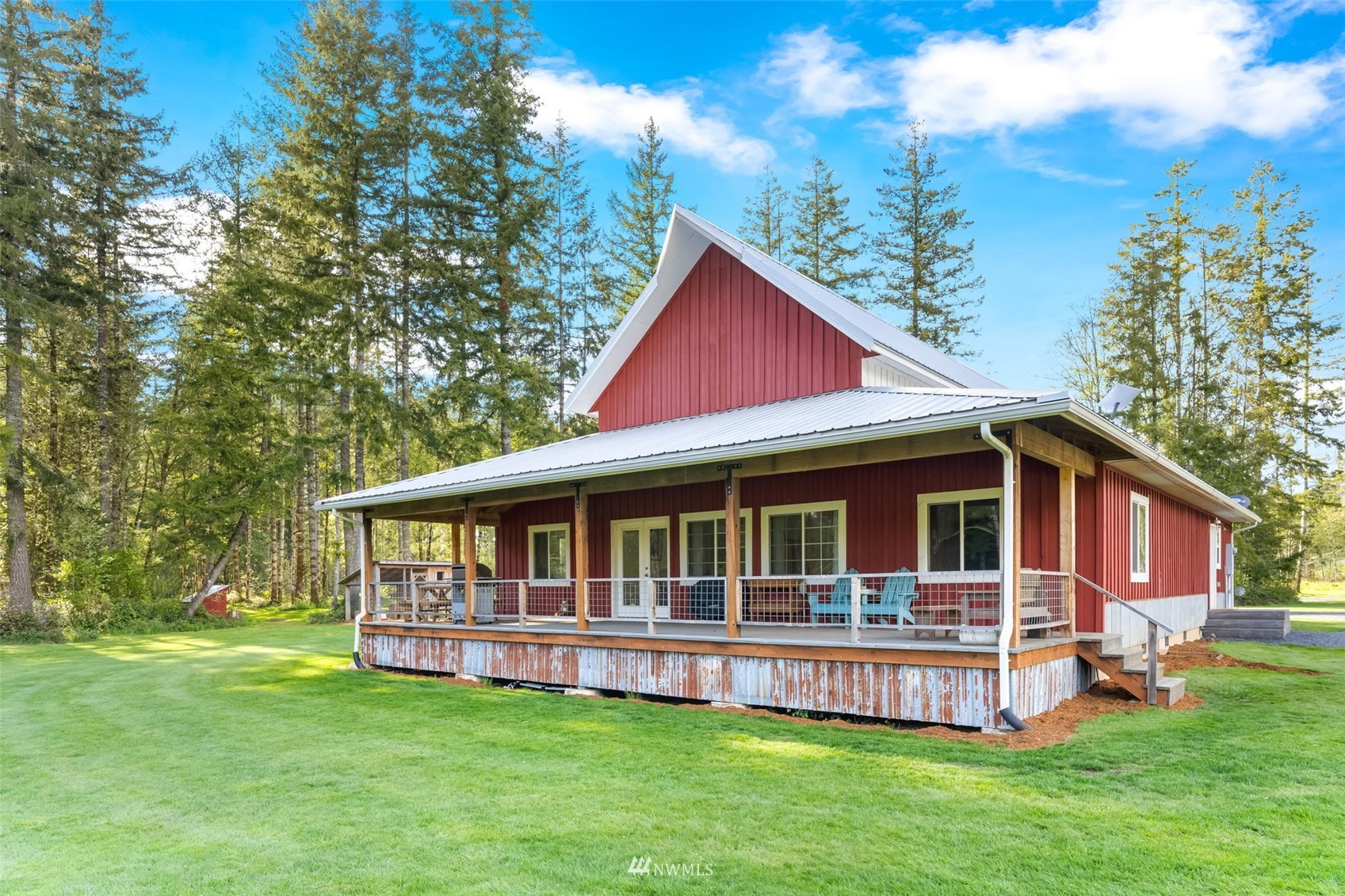 154 Rogerson Road Chehalis, WA 98532 - Photo 31 of 40 a view of house with a big yard and large trees