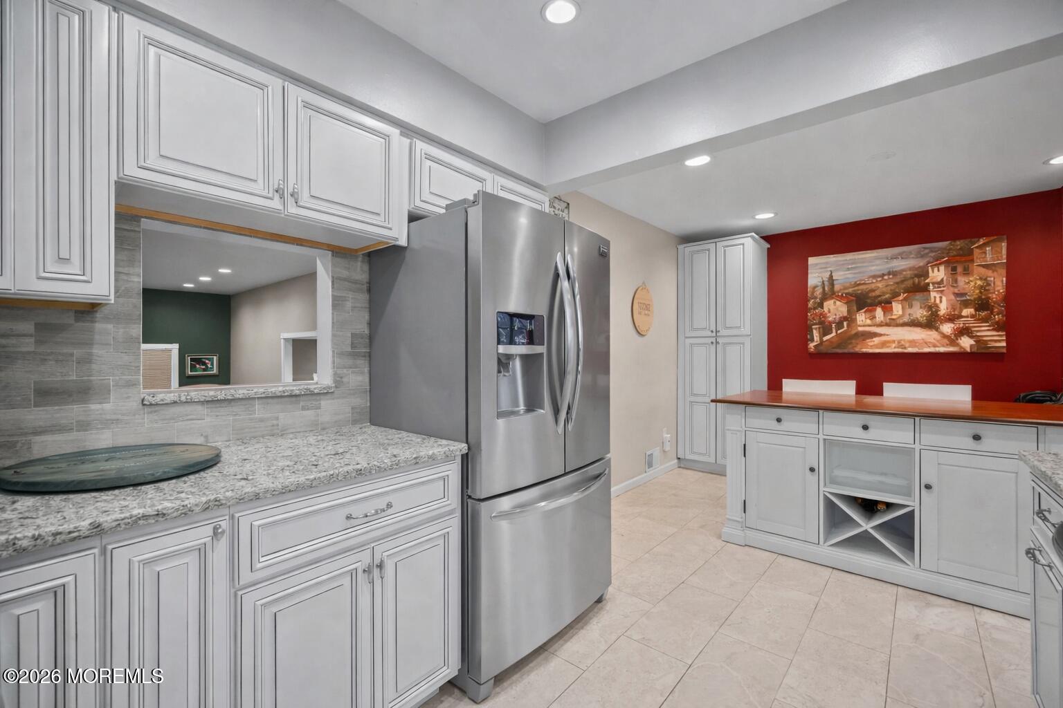 316 Middlewood Road Middletown, NJ 07748 - Photo 15 of 33 a kitchen with stainless steel appliances granite countertop a refrigerator and a sink