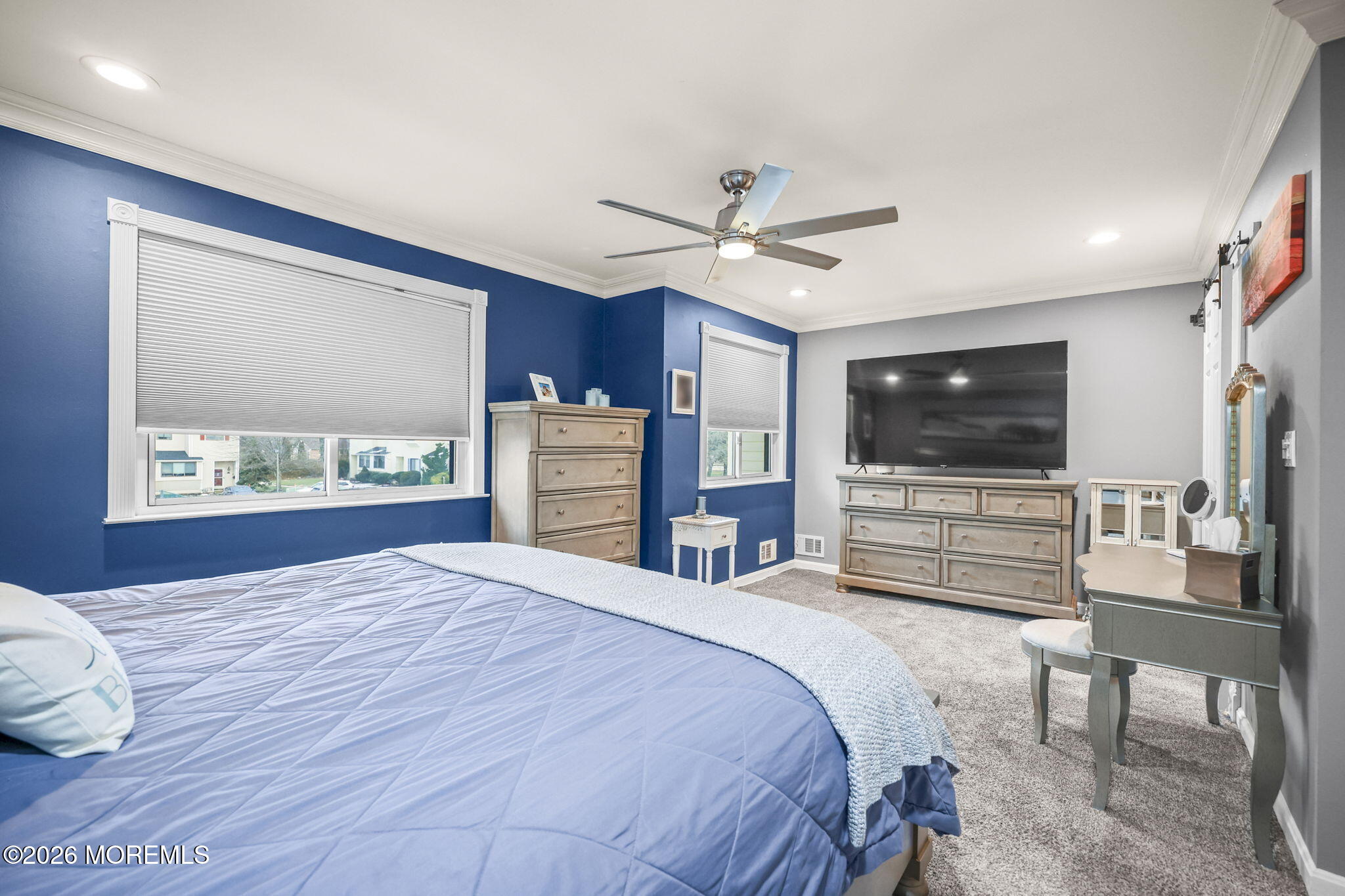 316 Middlewood Road Middletown, NJ 07748 - Photo 27 of 33 a bedroom with a bed and a flat screen tv