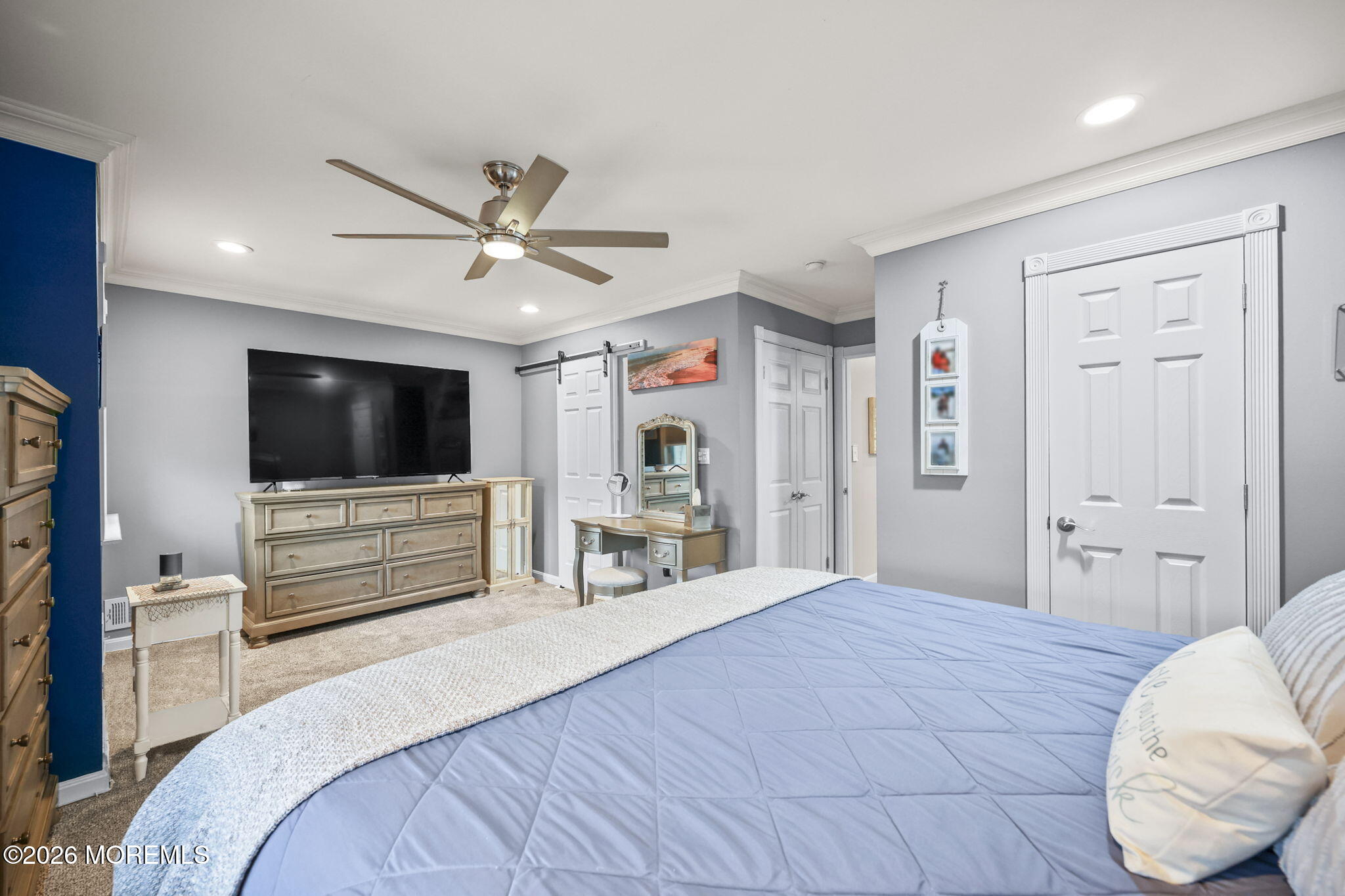 316 Middlewood Road Middletown, NJ 07748 - Photo 28 of 33 a bedroom with a bed and a flat screen tv