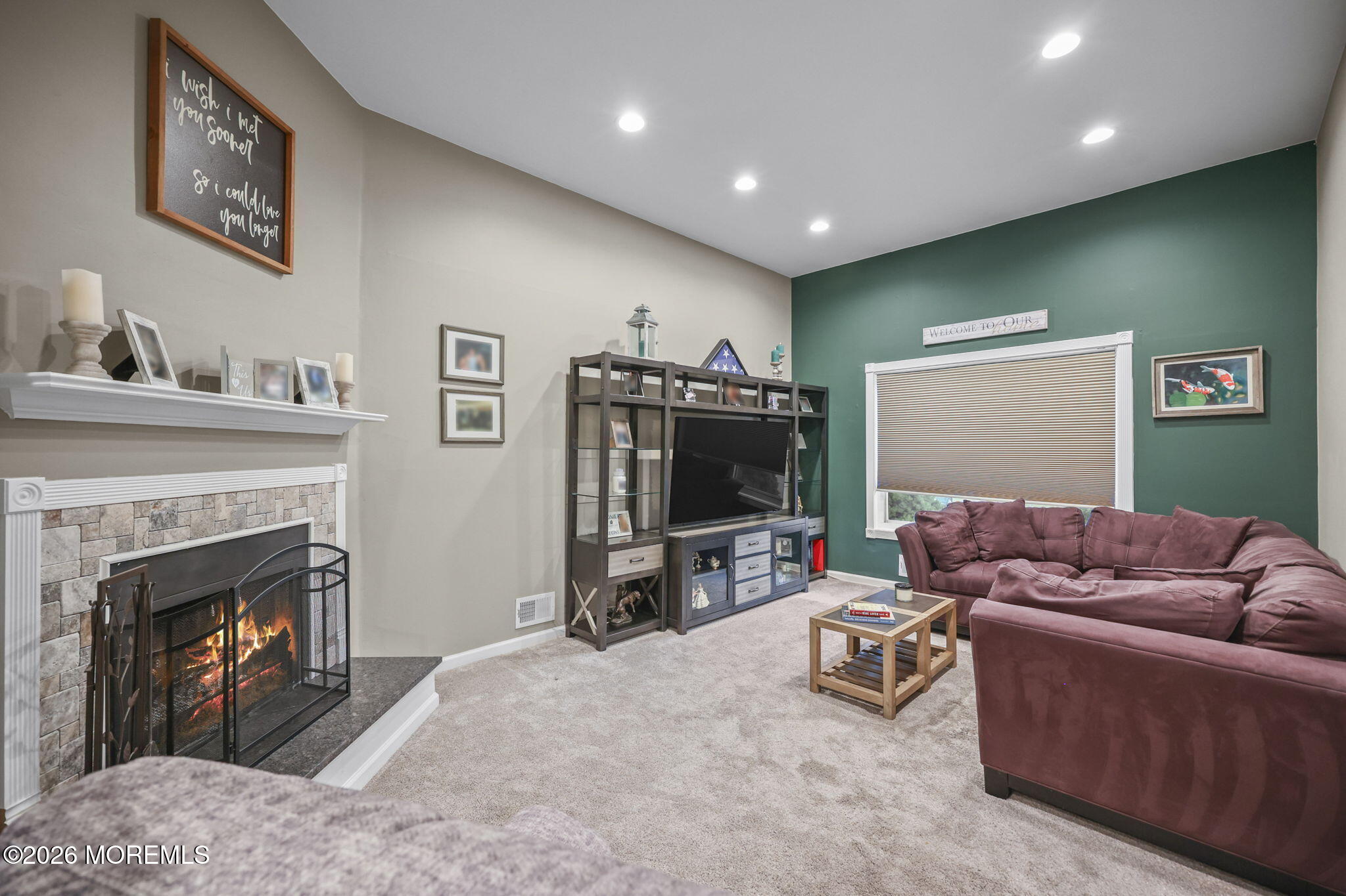316 Middlewood Road Middletown, NJ 07748 - Photo 5 of 33 a living room with furniture and a flat screen tv
