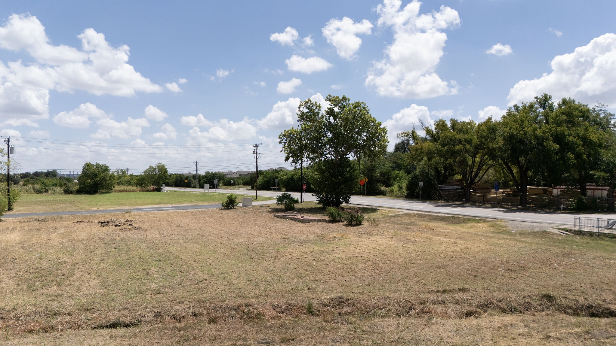 101 East South Street Leander, TX 78641 - Photo 14 of 18 Surrounding community with a lawn