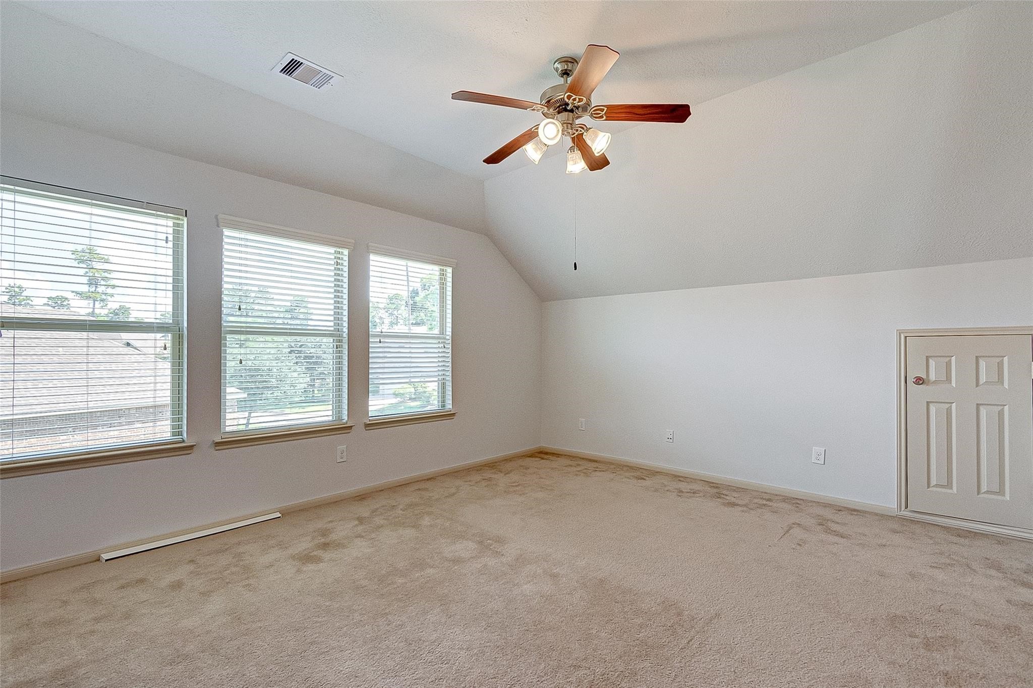 79 West Lasting Spring Circle Spring, TX 77389 - Photo 32 of 48 a view of an empty room with a window