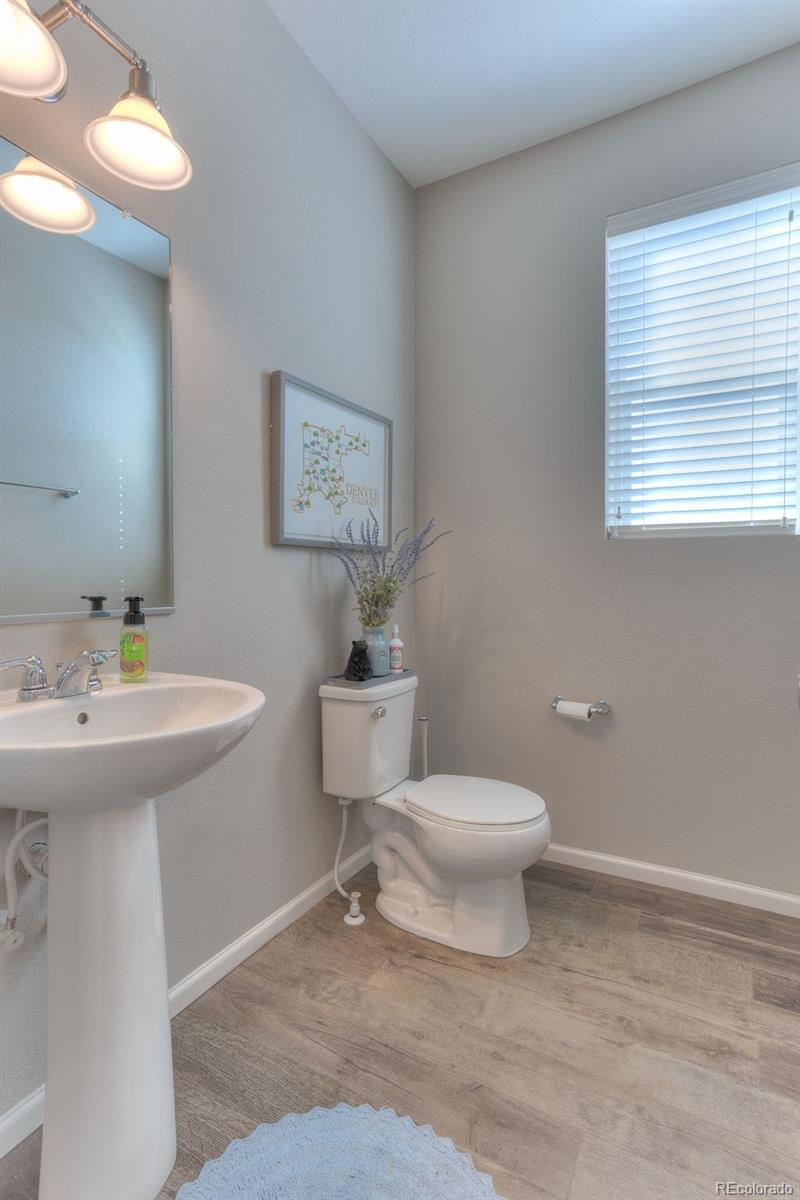 3550 Fennel Street Castle Rock, CO 80109 - Photo 12 of 37 a bathroom with a sink toilet and a mirror