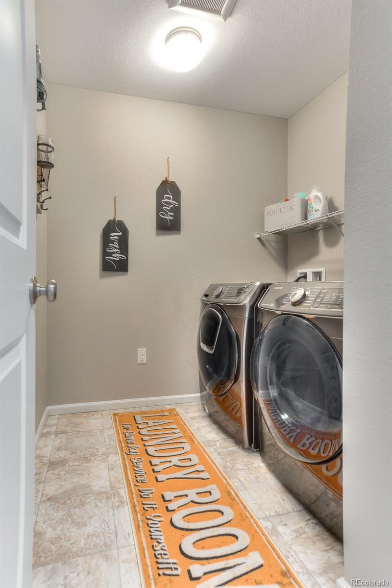 3550 Fennel Street Castle Rock, CO 80109 - Photo 20 of 37 a utility room with a sink