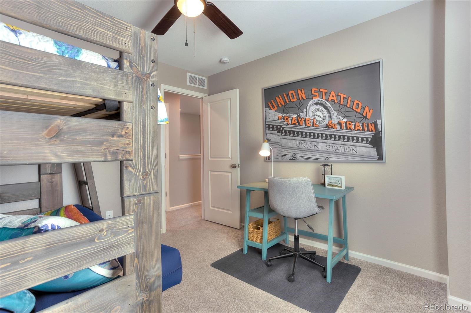 3550 Fennel Street Castle Rock, CO 80109 - Photo 23 of 37 a room with furniture and a potted plant