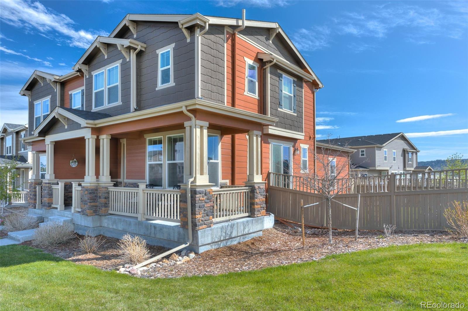 3550 Fennel Street Castle Rock, CO 80109 - Photo 3 of 37 a front view of a house with a yard
