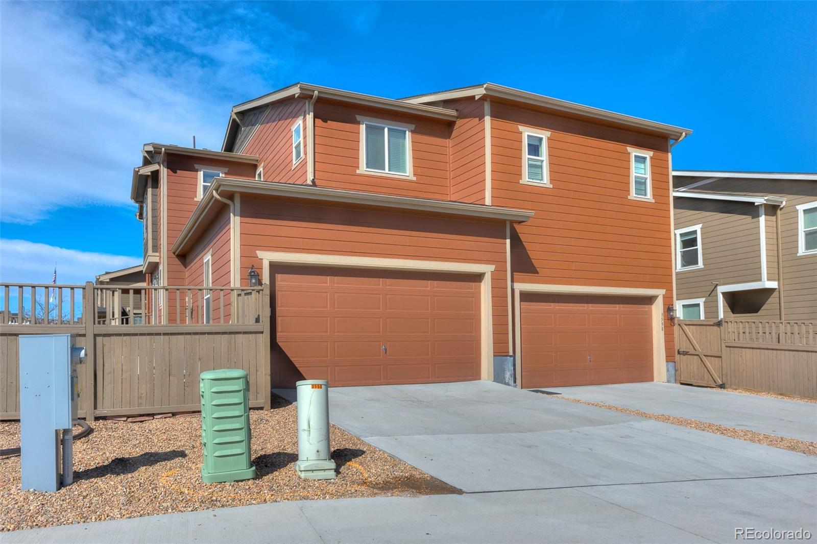 3550 Fennel Street Castle Rock, CO 80109 - Photo 33 of 37 a front view of a house with a garage